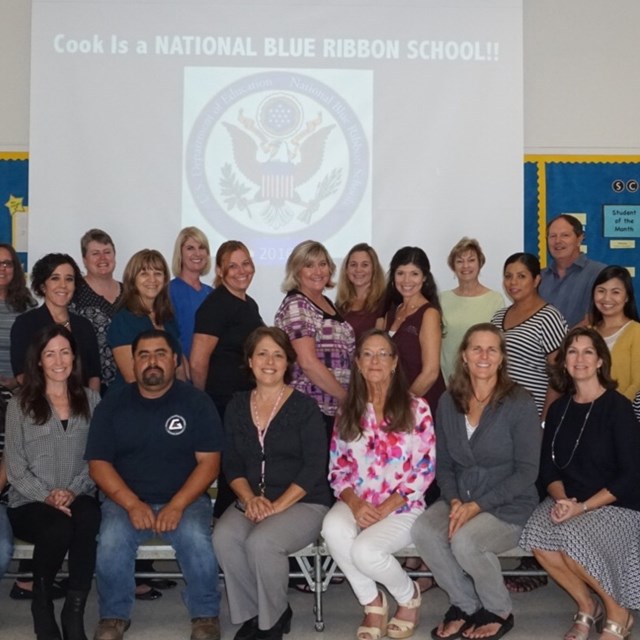 Our staff join in for a photo at the Blue Ribbon ceremony.