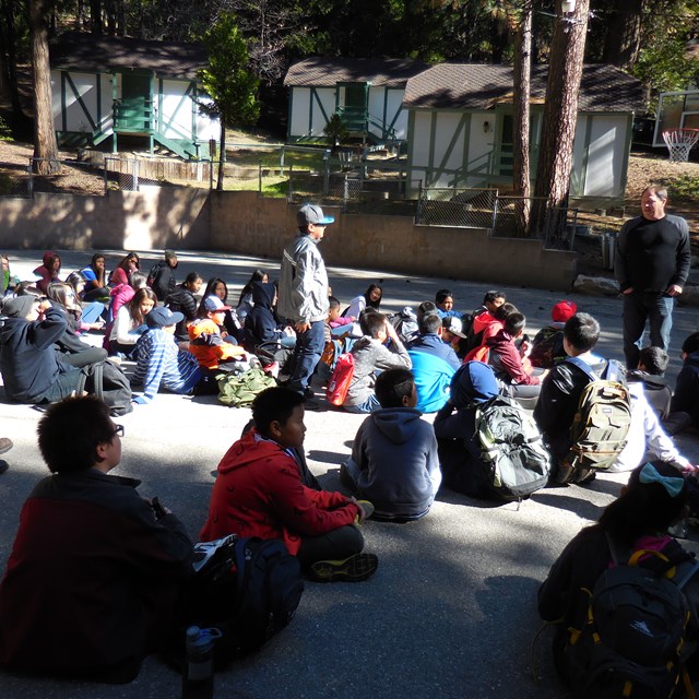 Students get in a circle and do a quick whip around to discuss their favorite part of the day.