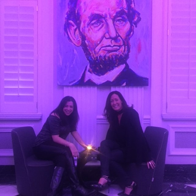These two lovely ladies take a photo with Abraham Lincoln, the fifth president of the United States.