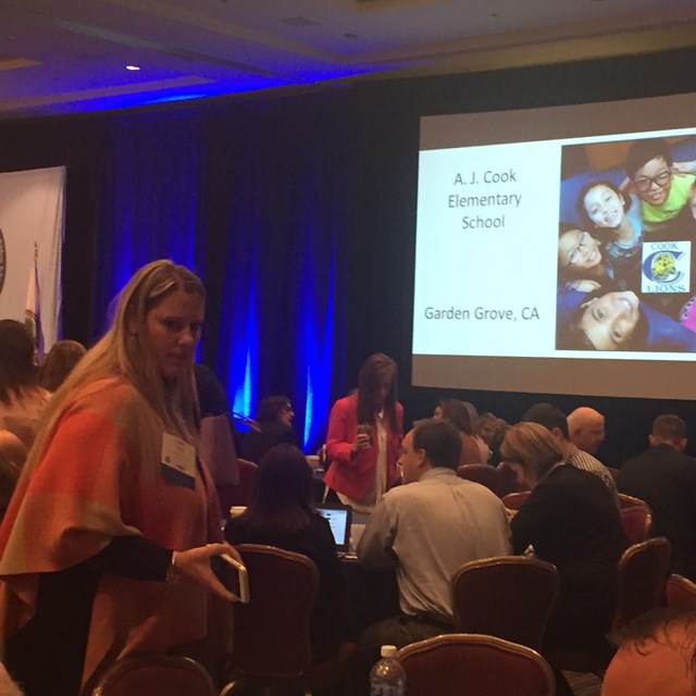 Before the presentation, staff members go to accolade each other for their hard work.
